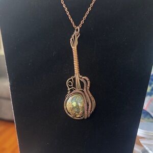 Hand Crafted Copper Wire Guitar Pendant with Indonesian Blue Common Opal